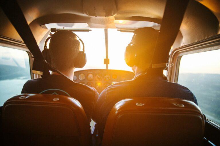 two men piloting plane during daytime: RideShare Chronicles: March 21, 2025